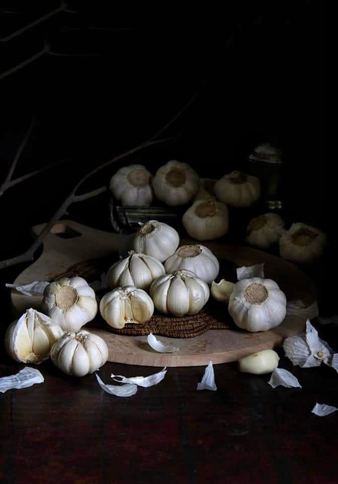 Garlic bulbs on a board